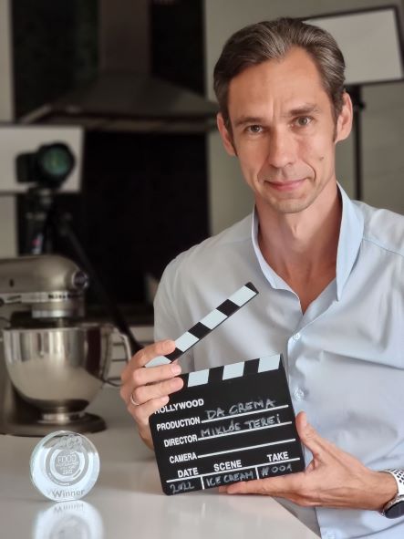 Person Holding Clapperboard